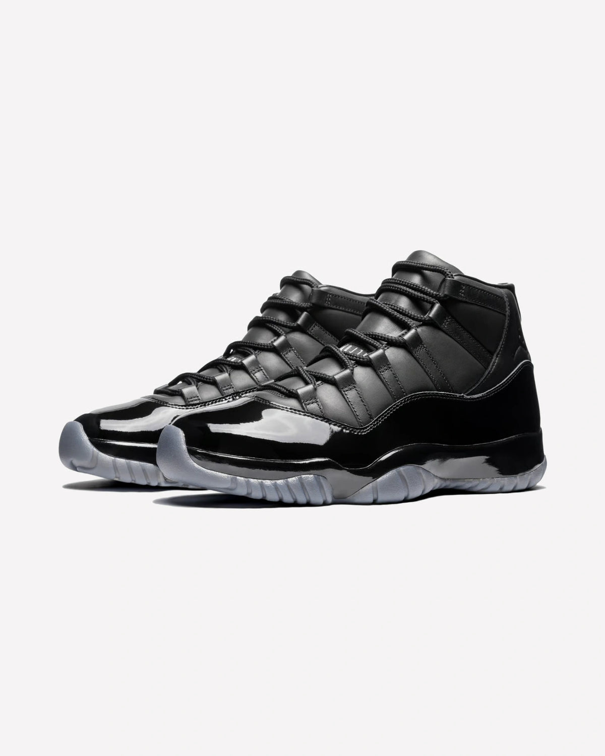 Jordan 11 Retro Comme des Garçons Homme Plus Black — detalle del upper