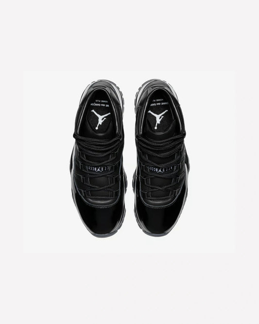 Jordan 11 Retro Comme des Garçons Homme Plus Black — suela exterior