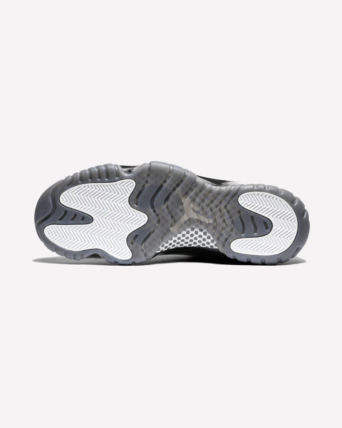 Jordan 11 Retro Comme des Garçons Homme Plus Black — detalle del logo