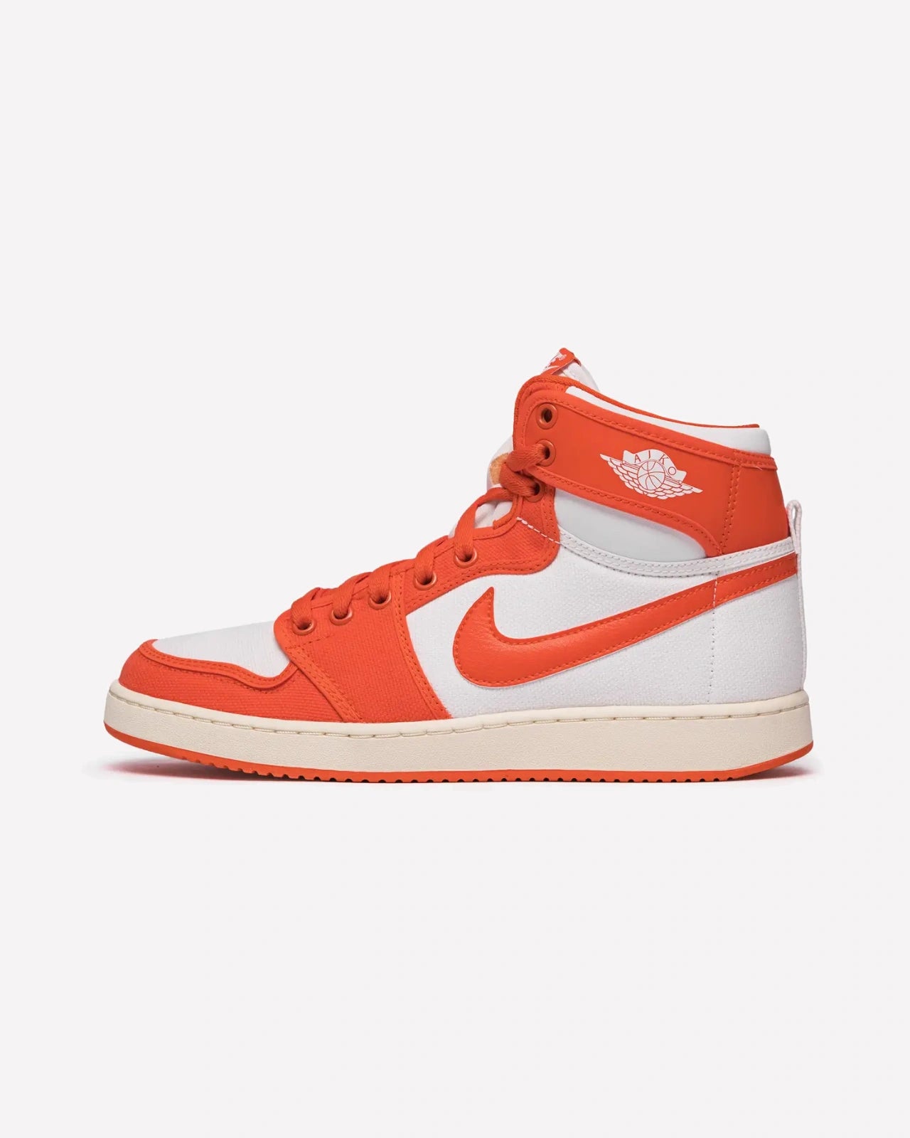 Jordan 1 Retro AJKO Rush Orange — vista lateral