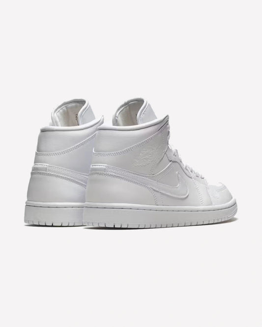 Jordan 1 Mid Triple White (2022) — Vista del par