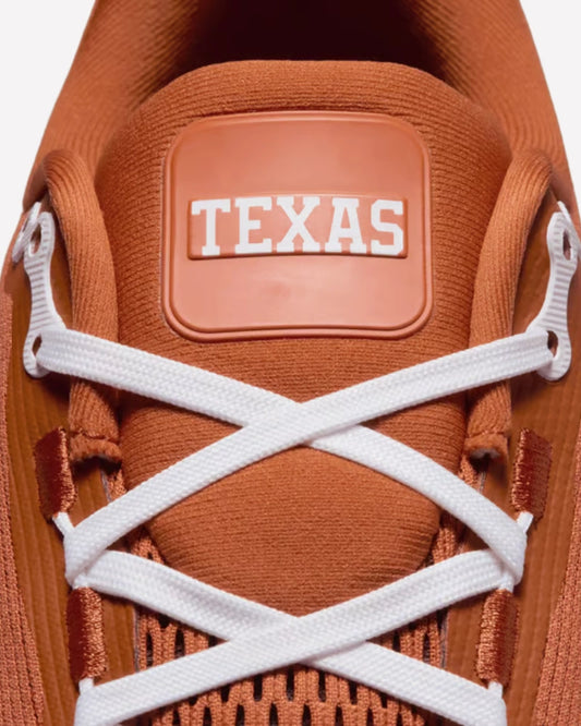 Nike Vomero 18 Texas — Perfil lateral