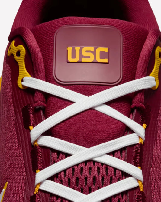 Nike Vomero 18 USC — vista de perfil