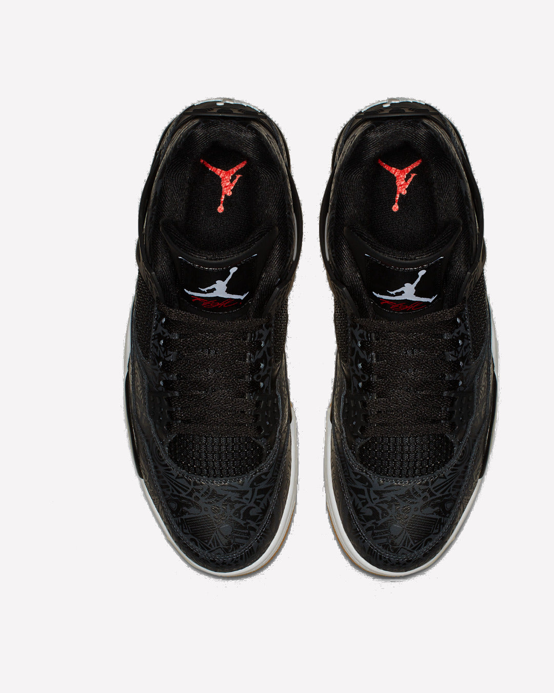 Jordan 4 Retro Laser Black Gum — vista de la suela
