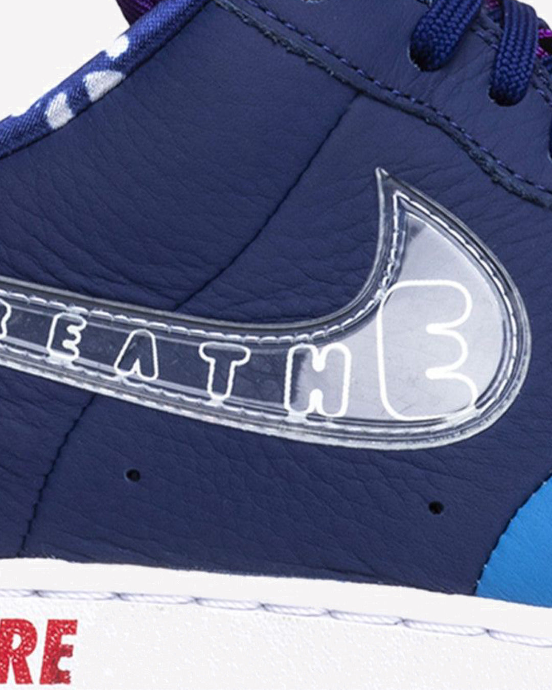 Nike Air Force 1 Low Doernbecher (2018) — detalle del Swoosh
