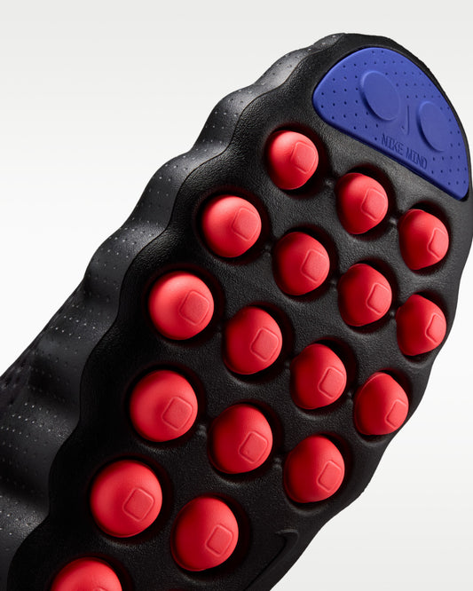 Nike Mind 002 AMP Black Indigo Burst — detalle del upper